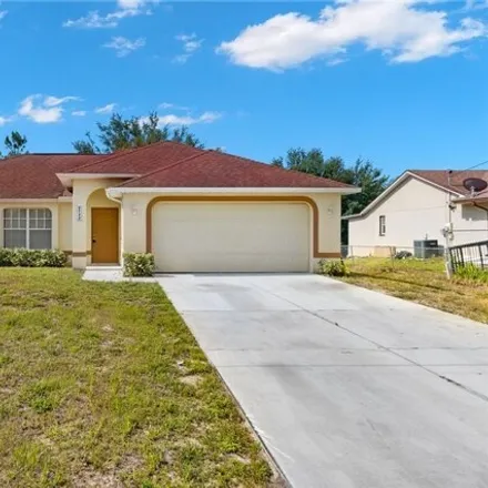 Rent this 4 bed house on 3875 16th Street West in Lehigh Acres, FL 33971