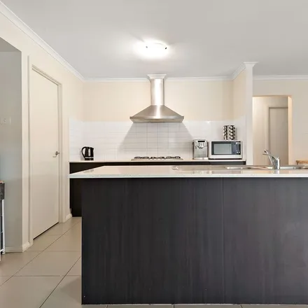 Rent this 4 bed apartment on Kite Street in Aberglasslyn NSW 2320, Australia