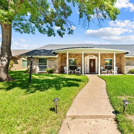 Rent this 4 bed house on 1101 Briarcreek Drive in Arlington, TX 76012