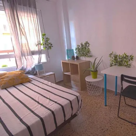 Rent this 4 bed room on Carrer del Mestre Valls in 46022 Valencia, Spain