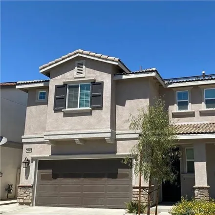 Rent this 4 bed house on Cessan Lane in Moreno Valley, CA 92551