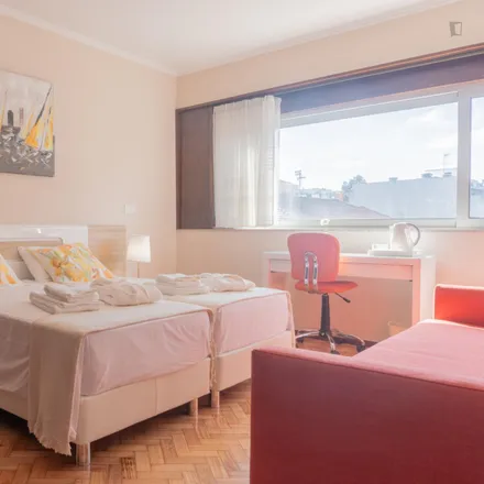 Rent this 8 bed room on Rua de Faria Guimarães in 4200-291 Porto, Portugal