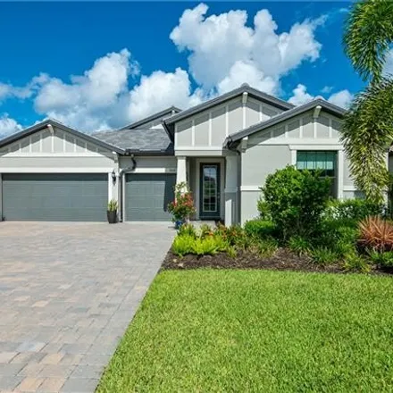 Buy this 4 bed house on 6498 Moss Oak Court in Lee County, FL 33917