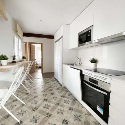 Rent this 8 bed apartment on Panadería La Gallega in Calle del Espinar, 28047 Madrid
