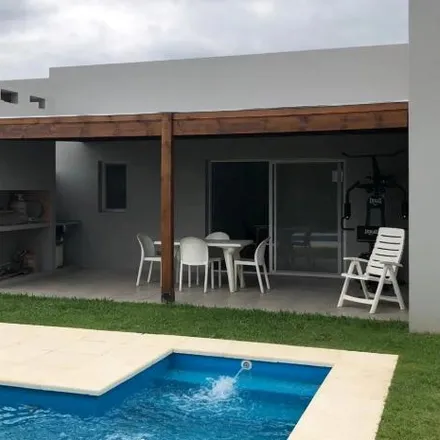 Buy this 4 bed house on unnamed road in Partido de Escobar, 1623 El Cazador