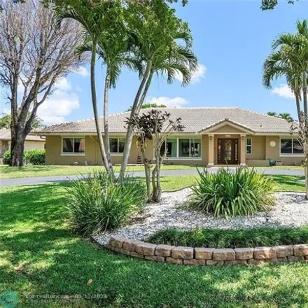Buy this 5 bed house on 1827 Northwest 102nd Terrace in Coral Springs, FL 33071