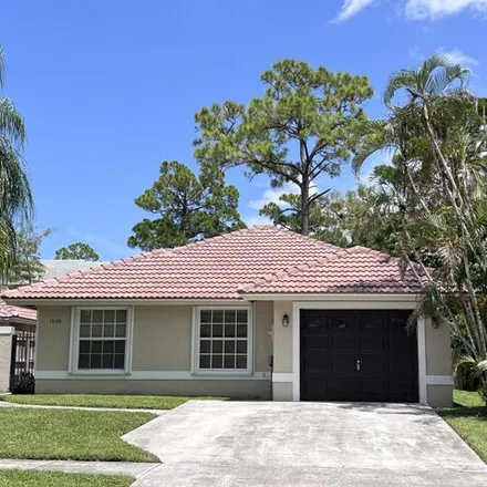 Rent this 3 bed house on 1598 Hawthorne Place in Wellington, FL 33414