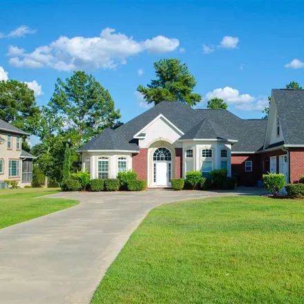 Rent this 4 bed townhouse on 201 Stratford Hills Drive in Bonaire, GA 31005