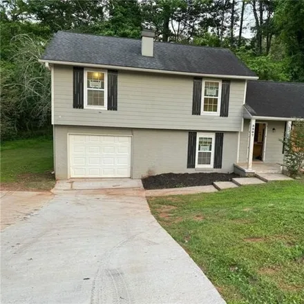 Buy this 3 bed house on 5507 Flat Shoals Parkway in DeKalb County, GA 30034