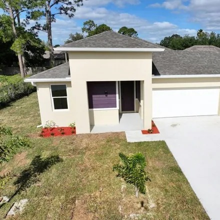 Buy this 4 bed house on 436 Borraclough Avenue Northwest in Palm Bay, FL 32907