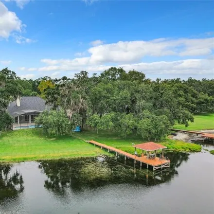 Buy this 5 bed house on 1026 Oakpoint Circle in Orange County, FL 32712