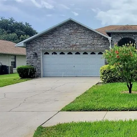 Rent this 4 bed house on 5702 Sweetheart Court in Saint Cloud, FL 34772