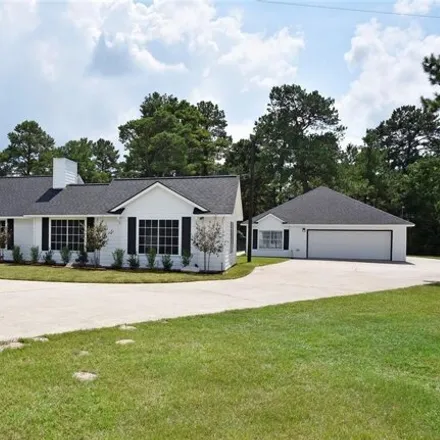 Buy this 3 bed house on Pine Country Boulevard in Tomball, TX