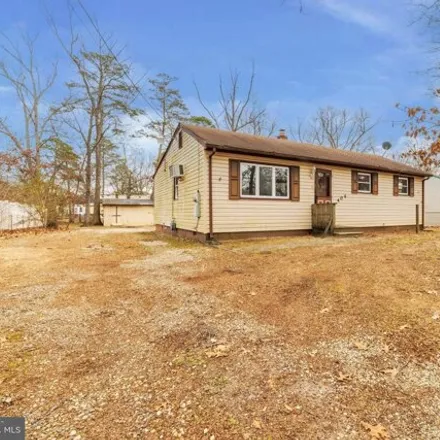 Buy this 4 bed house on 442 Cains Mill Road in Buena Vista Township, Atlantic County