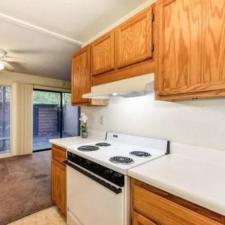 Buy this 1 bed condo on 810 Woodside Lane East in Sacramento County, CA 95825