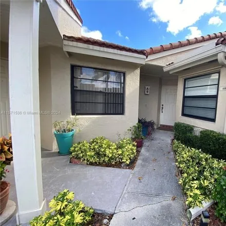 Rent this 2 bed house on 6009 Northwest 170th Terrace in Hialeah Gardens, FL 33015
