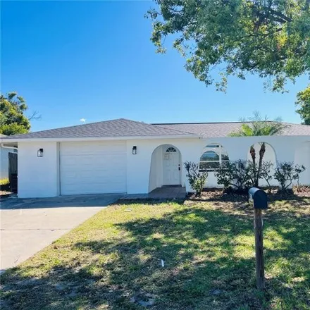 Buy this 3 bed house on 3658 Odom Drive in Elfers, FL 34652