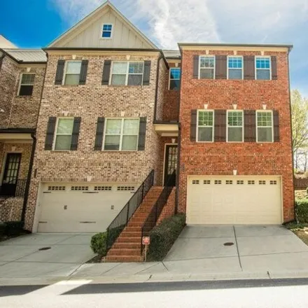 Buy this 4 bed townhouse on 5904 Norfolk Chase Road in Peachtree Corners, GA 30092