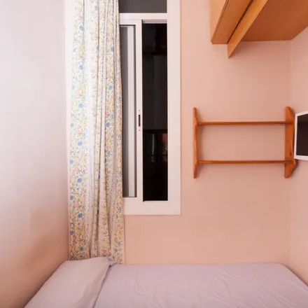 Rent this 4 bed room on Super Alimentació in Carrer Nou de la Rambla, 08001 Barcelona