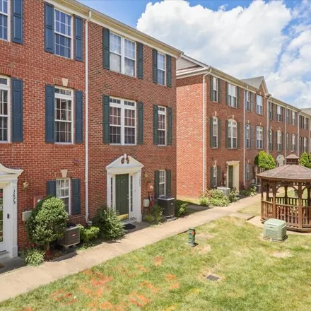 Buy this 4 bed townhouse on 3675 Madison View Ln in Falls Church, Virginia