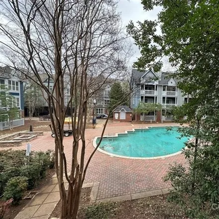 Rent this 1 bed condo on Fourth Ward Square Condomiums Pool in North Smith Street, Charlotte
