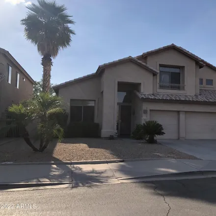 Rent this 4 bed house on 720 North Swallow Lane in Gilbert, AZ 85234