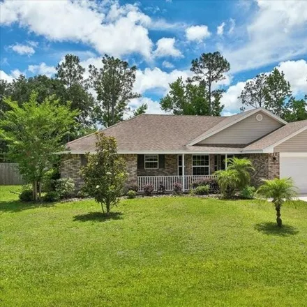 Buy this 3 bed house on 79 Radius Place in Palm Coast, FL 32164