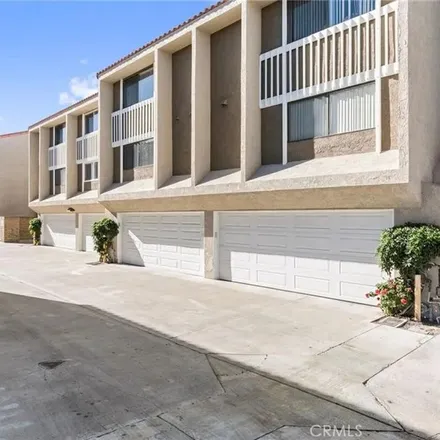 Rent this 3 bed townhouse on 371 Wake Forest Road in Thurin, Costa Mesa