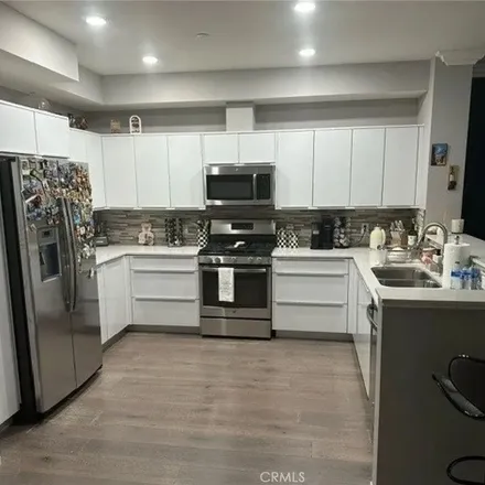 Rent this 4 bed apartment on 5259 Vantage Avenue in Los Angeles, CA 91607