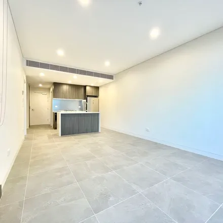 Rent this 3 bed apartment on 3 Nipper Street in Homebush NSW 2140, Australia