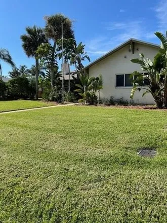 Rent this 3 bed house on 257 5th Avenue in Melbourne Beach, Brevard County
