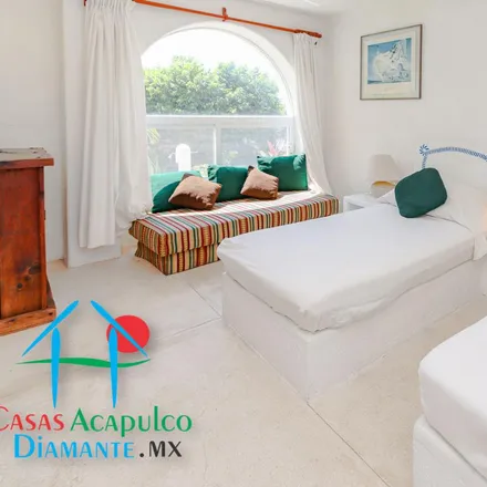 Buy this 4 bed house on Calle Paseo del Mástil in Fraccionamiento Marina Brisas, 39300 Acapulco