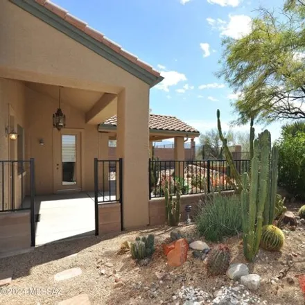 Buy this 4 bed house on 4975 West Wild Burro Spring Drive in Marana, AZ 85658