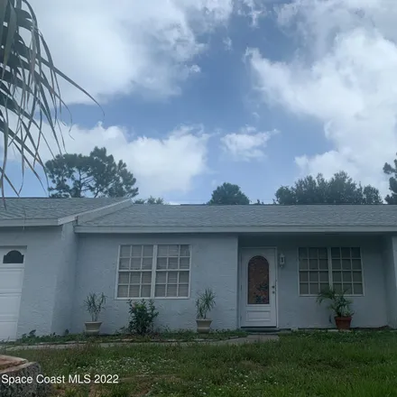 Buy this 3 bed house on 337 Collings Street Southeast in Palm Bay, FL 32909