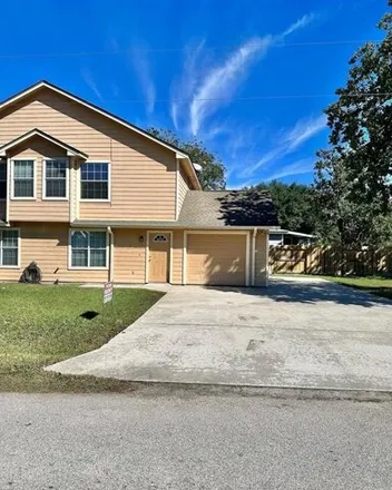 Rent this 2 bed house on 421 North Howard Street in Tomball, TX 77375