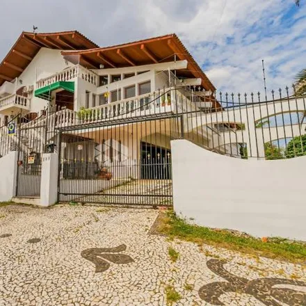 Buy this 4 bed house on Escola Açorianos in Rua Araruama 65, Vila Jardim