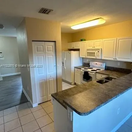 Rent this 2 bed apartment on 1550 Northeast 33rd Avenue in Homestead, FL 33033