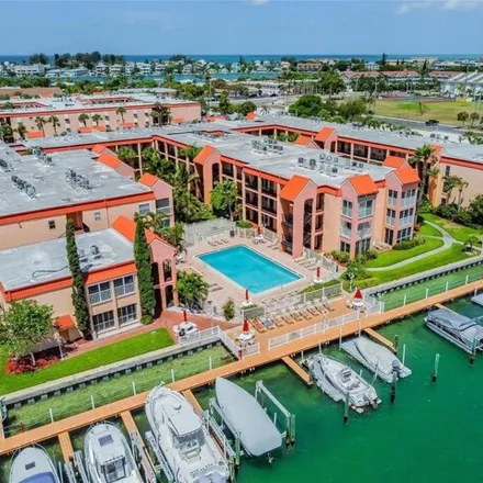 Buy this 2 bed condo on 9065 Captiva Circle in Saint Pete Beach, Pinellas County