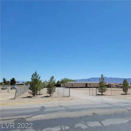 Buy this 4 bed house on 1611 East Gamebird Road in Manse, Pahrump