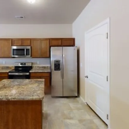 Rent this 3 bed apartment on 7627 Conifer Cone Grv in Wolf Ranch, Colorado Springs
