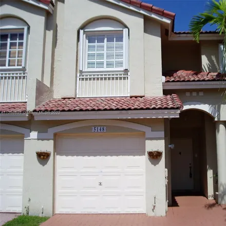 Rent this 3 bed townhouse on Northwest 56th Terrace in Doral, FL 33178