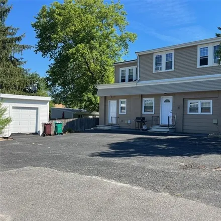 Buy this 4 bed townhouse on 187 Orchard Street in Woonsocket, RI 02895
