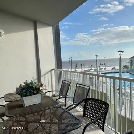 Rent this 3 bed condo on West Beach Boardwalk in Biloxi, MS 39531
