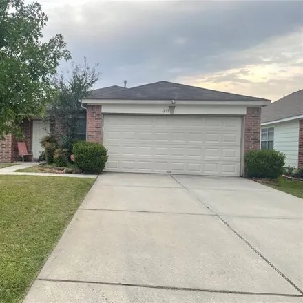 Rent this 3 bed house on 1891 Cold River Drive in Harris County, TX 77396