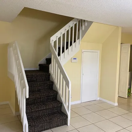 Rent this 3 bed apartment on 3032 Cocoplum Circle in Coconut Creek, FL 33063