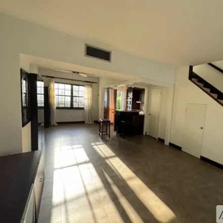 Rent this 2 bed townhouse on 8962 Collins Ave