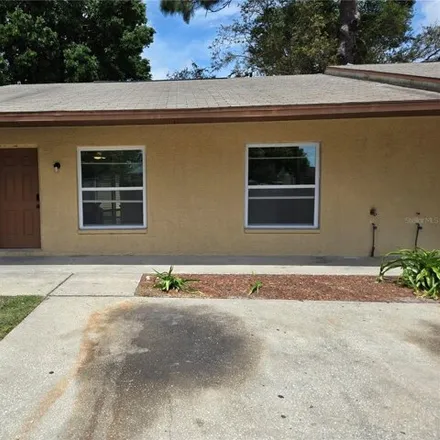 Rent this 2 bed townhouse on 5793 Pine Street in New Port Richey, FL 34652