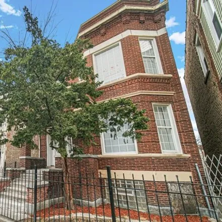 Rent this 3 bed apartment on 6111 South Eberhart Avenue in Chicago, IL 60637