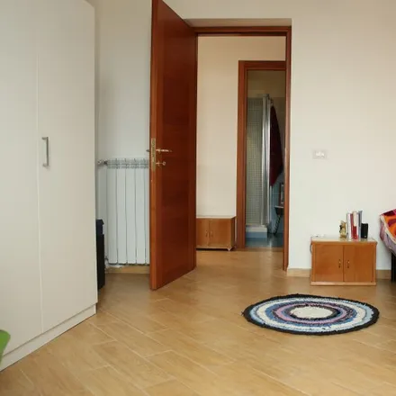 Rent this 1 bed room on Via Pietro Cartoni in 00152 Rome RM, Italy
