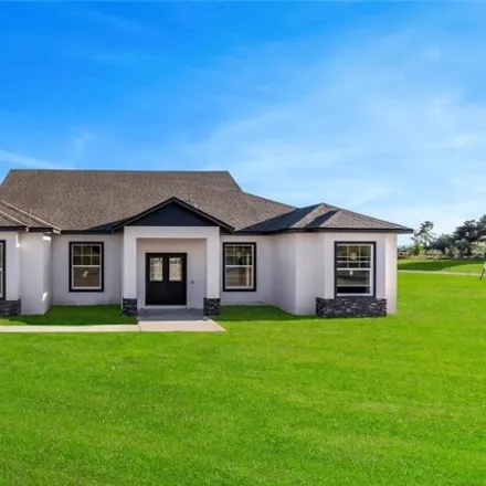 Buy this 4 bed house on 9040 Oakheart Lane in Clermont, FL